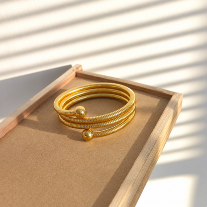 Golden Coil Orb Cuff